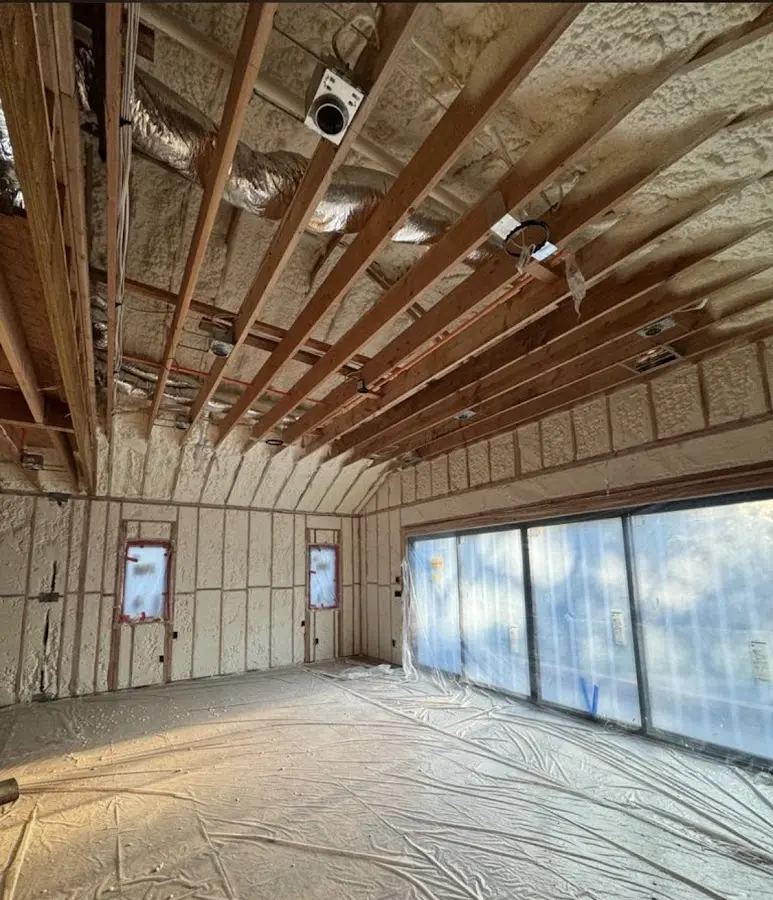 Interior walls and ceiling insulated with spray foam during new construction in Pasadena